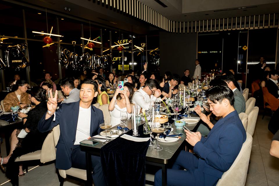 Dinner tables full of guests at a Tom Talks night