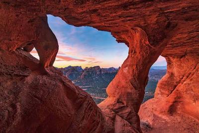Sedona red rock arch at dusk