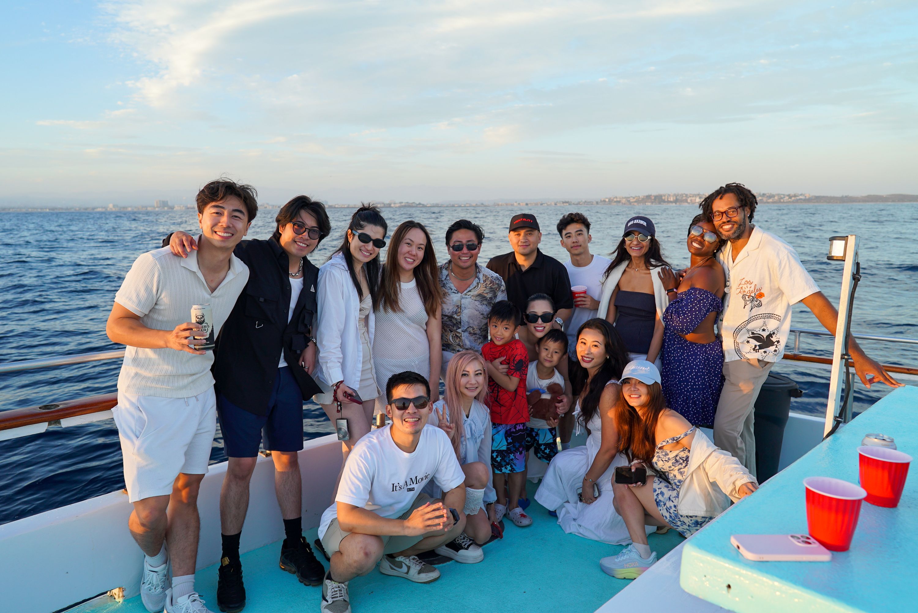 Guests together on a boat at a tom talks event.
