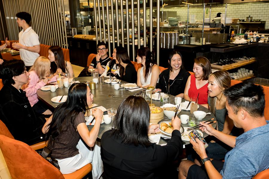 A full room gathered over dinner at Tom Talks